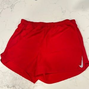 Red Nike dry fit running / training / workout shorts